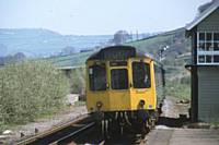 An almost head-on shot of a class 110 at Mytholmroyd before the forest took over and when the signalbox was still in use, circa 1975. R S Greenwood